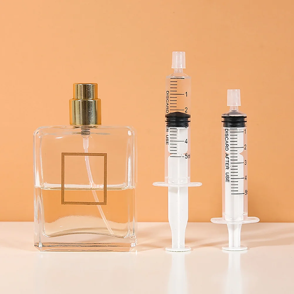 Seringue distributrice De parf - Perfume Travel Set avis et prix